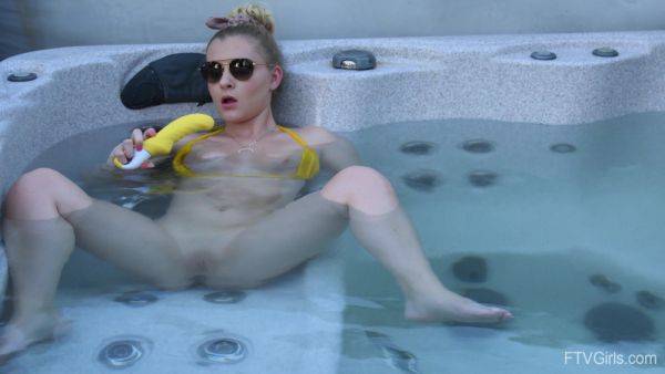 Sweet blonde inserts big dildo in her shaved pussy while in the pool - hellporno.com on freevids.org