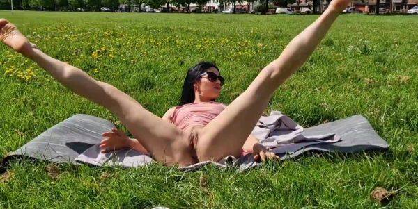 Brunette milf flashing pussy and pissing in a public park - anysex.com on freevids.org